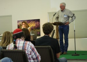 John Fife, the founder of the Sanctuary Movement in Tucson, introduces Alexia Salvatierra at The Struggle Continues conference on Nov. 30. (Photo by: Brenna Goth)